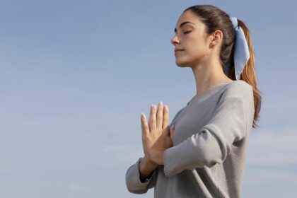 side view woman meditating nature 1