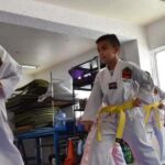 Niños practicando karate en la Casa del Bien Común